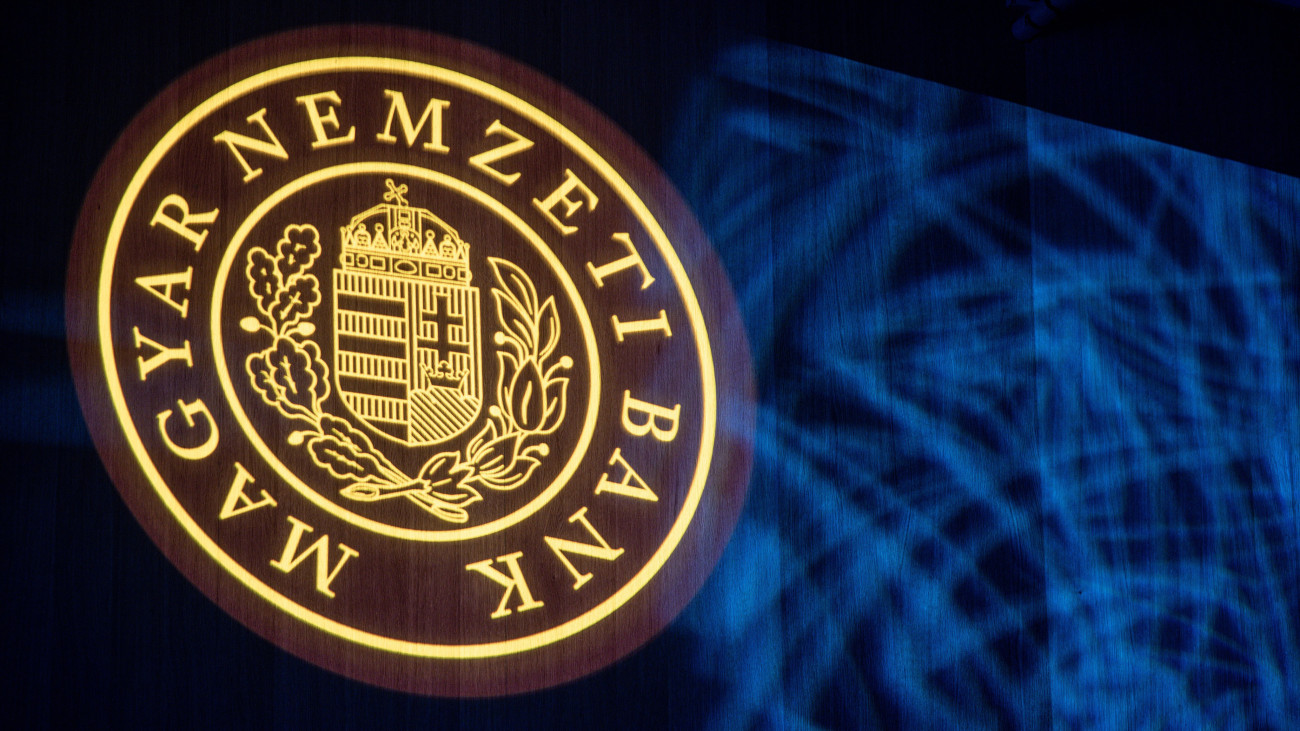 A logo for the Magyar Nemzeti Bank, the Hungarian central bank, during the Lamfalussy conference in Budapest, Hungary, on Monday, Feb. 6, 2023. Hungary and the global economy have passed the worst on inflation in part due to softer demand, National Bank of Hungary Deputy Governor Mihaly Patai told the conference. Photographer: Akos Stiller/Bloomberg via Getty Images