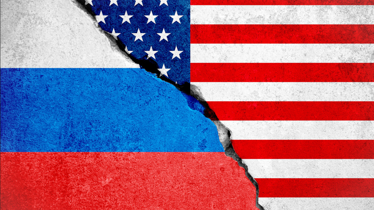 united states of america flag on broken damage wall and half russian white red blue color flag, relationship crisis between russia and usa concept