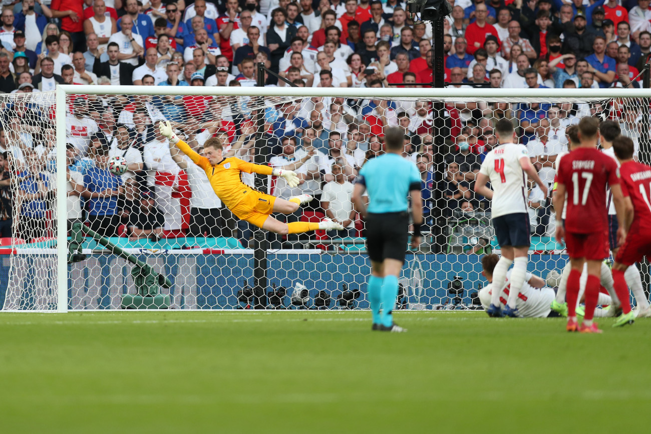 LONDON, ENGLAND - JULY 07: Jordan Pickford of England fails to save the Denmark first goal scored by Mikkel Damsgaard (Not pictured) during the UEFA Euro 2020 Championship Semi-final match between England and Denmark at Wembley Stadium on July 07, 2021 in London, England. (Photo by Alex Morton - UEFA/UEFA via Getty Images)