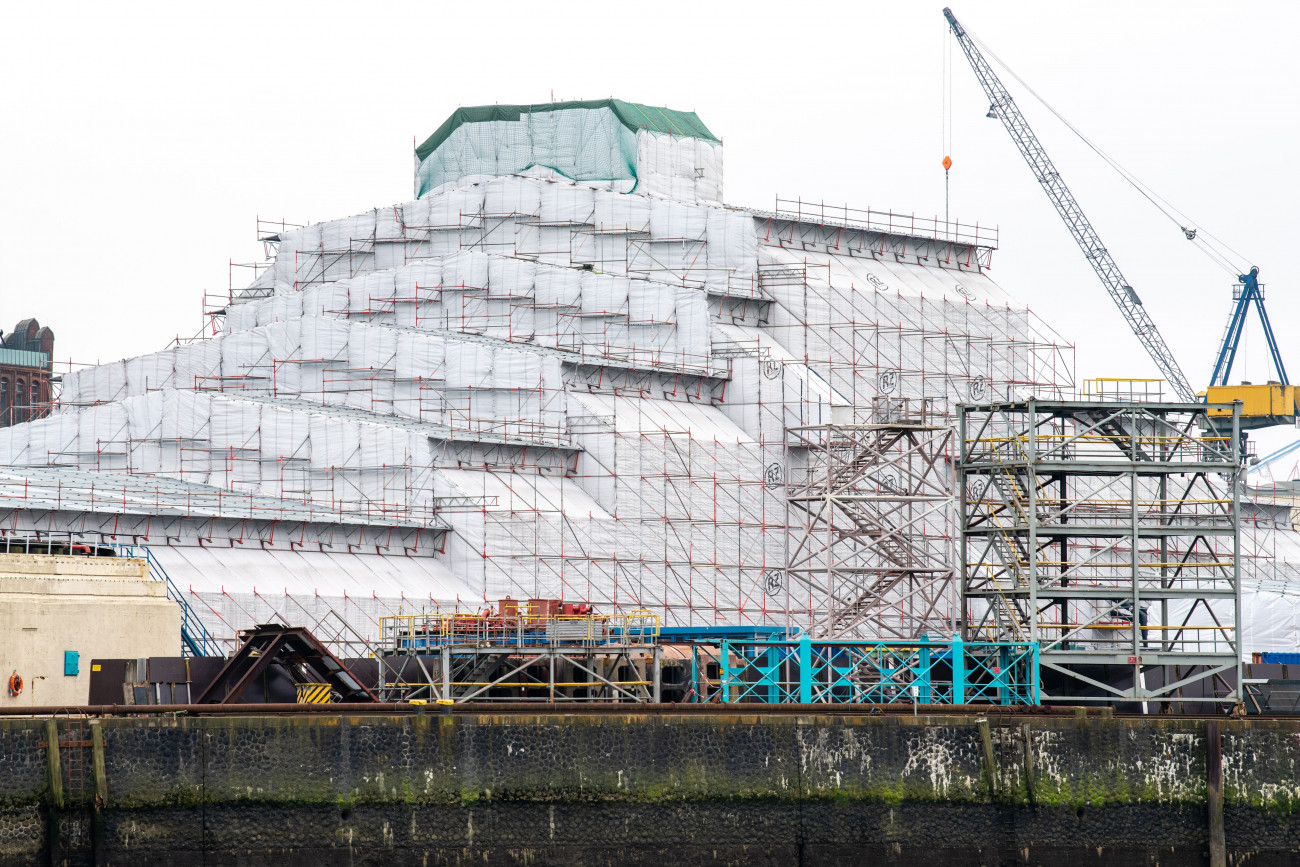 The Dilbar superyacht, owned by Russian billionaire Alisher Usmanov, under cover while undergoing refitting at the Blohm & Voss dock in Hamburg, Germany, on Friday, March 4, 2022. The superyacht, estimated to be worth $594 million by the Bloomberg Billionaires Index, hasn't been seized by the government after Usmanov was hit with European Union sanctions this week. Photographer: Imke Lass/Bloomberg via Getty Images