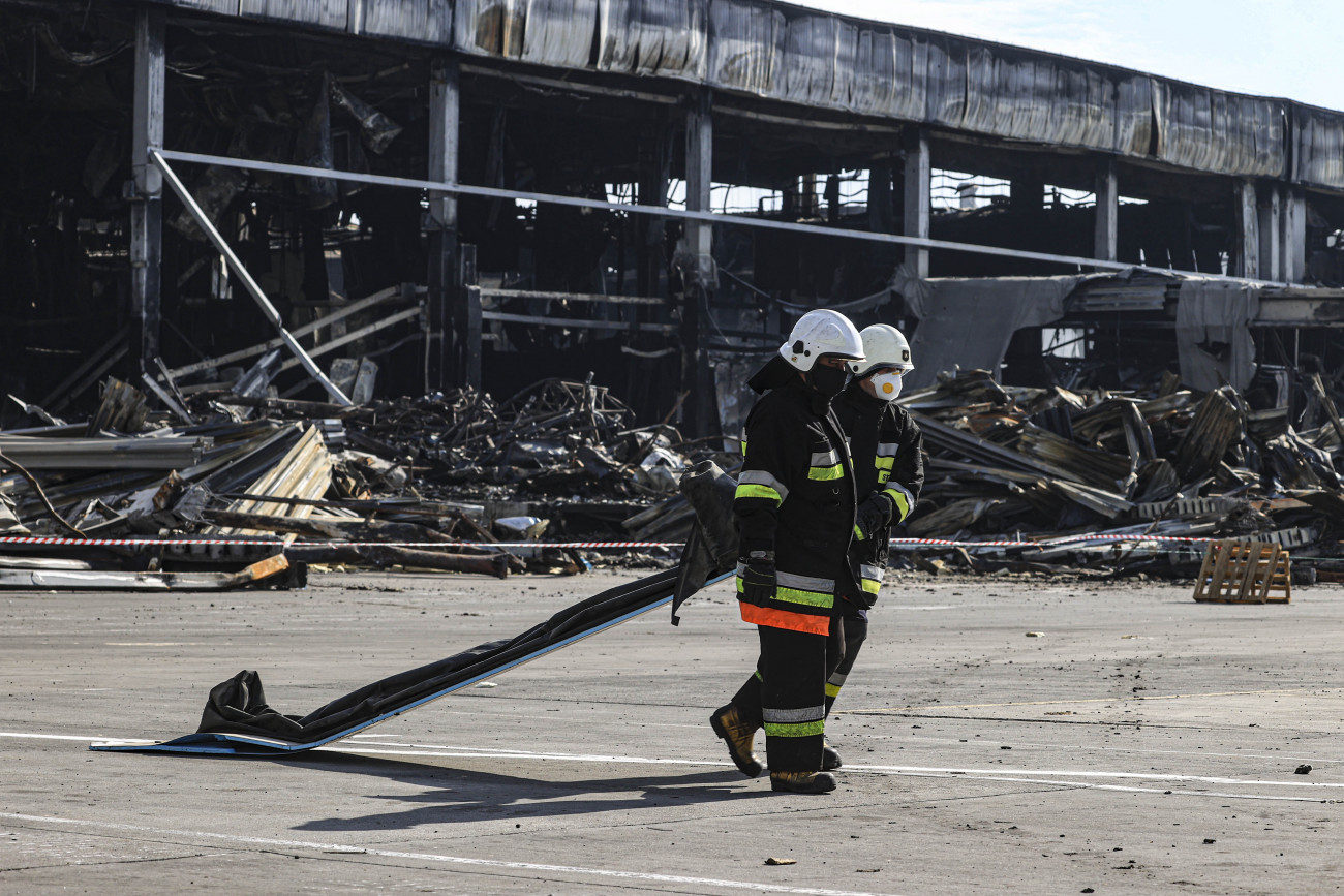KYIV, UKRAINE - MARCH 29: Firefighters works in the logistics warehouse, which contained 50 thousand tons of food while it was bombed on 13 March in the Brovary region, as Russian attacks continue near Kyiv, Ukraine on March 29, 2022. (Photo by Metin Aktas/Anadolu Agency via Getty Images)