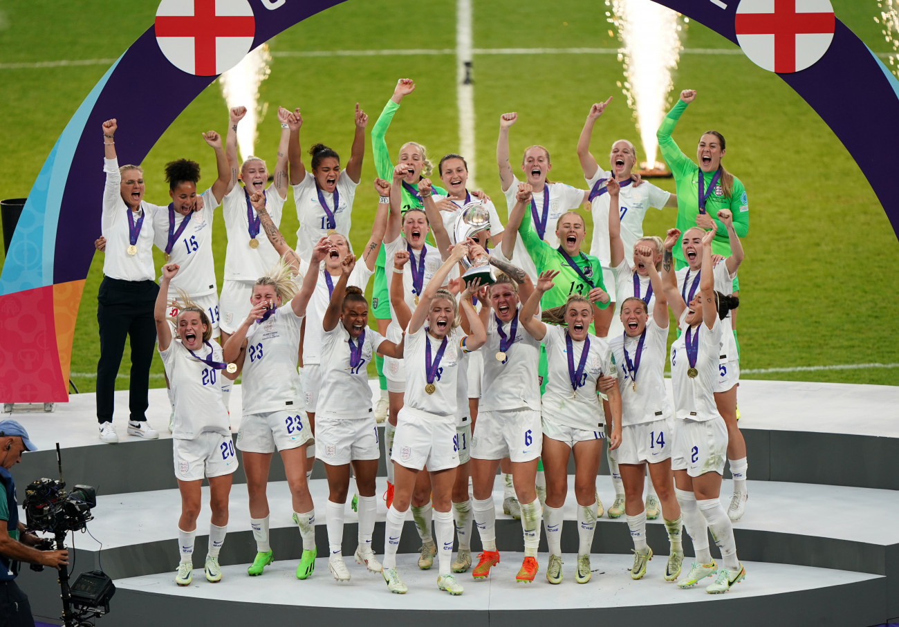 England's Leah Williamson and Millie Bright lift the trophy as England celebrate winning the during the UEFA Women's Euro 2022 final at Wembley Stadium, London. Picture date: Sunday July 31, 2022. (Photo by Joe Giddens/PA Images via Getty Images)