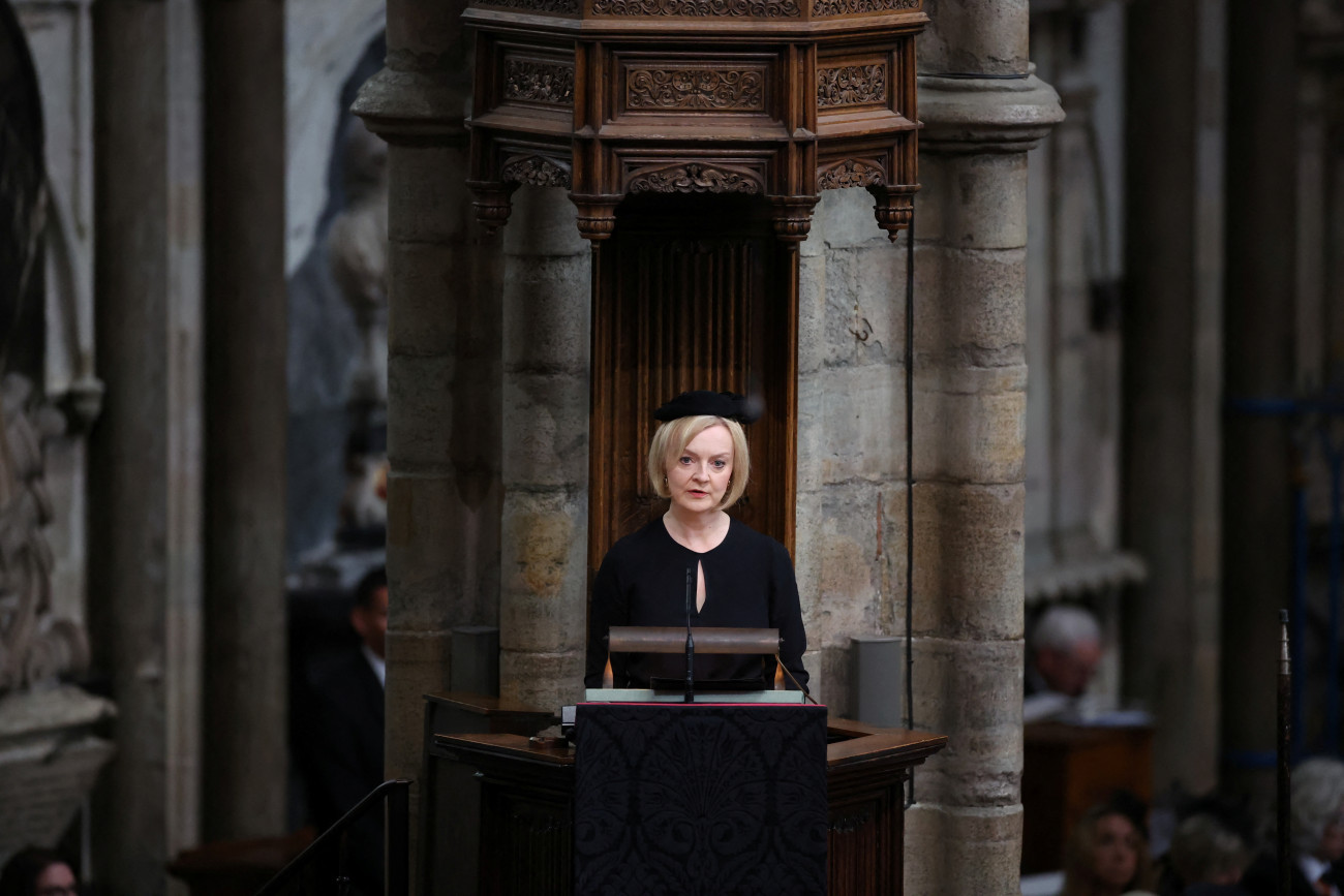 LONDON, ENGLAND - SEPTEMBER 19: British Prime Minister Liz Truss speaks in Westminster Abbey during the State Funeral of Queen Elizabeth II on September 19, 2022 in London, England.  Elizabeth Alexandra Mary Windsor was born in Bruton Street, Mayfair, London on 21 April 1926. She married Prince Philip in 1947 and ascended the throne of the United Kingdom and Commonwealth on 6 February 1952 after the death of her Father, King George VI. Queen Elizabeth II died at Balmoral Castle in Scotland on September 8, 2022, and is succeeded by her eldest son, King Charles III. (Photo by Phil Noble - WPA Pool/Getty Images)