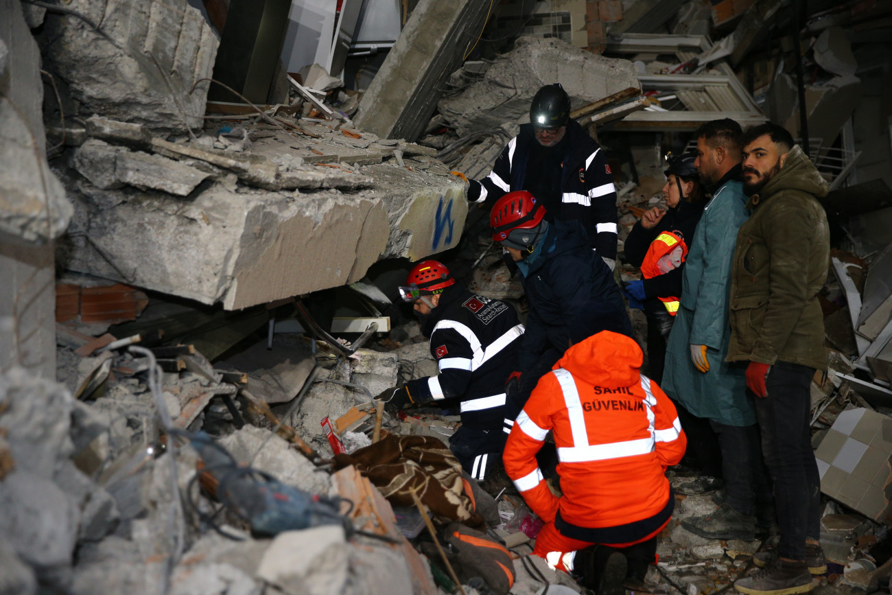 HATAY, TURKIYE - FEBRUARY 7: Search and rescue team work at the site in Hatay following 7.7 and 7.6 magnitude earthquakes hit Turkiye's Kahramanmaras, on February 7, 2023. 4 people, including a child, rescued from the wreckage of collapsed buildings. Early Monday morning, a strong 7.7 earthquake, centered in the Pazarcik district, jolted Kahramanmaras and strongly shook several provinces, including Gaziantep, Sanliurfa, Diyarbakir, Adana, Adiyaman, Malatya, Osmaniye, Hatay, and Kilis. Later, at 13.24 p.m. (1024GMT), a 7.6 magnitude quake centered in Kahramanmaras' Elbistan district struck the region. Turkiye declared 7 days of national mourning after deadly earthquakes in southern provinces. (Photo by Sezgin Pancar/Anadolu Agency via Getty Images)