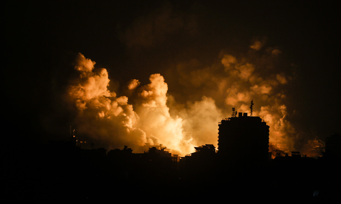 A smoke rises and ball of fire over a buildings in Gaza City on October 9, 2023 during an Israeli air strike.  (Photo by Sameh Rahmi/NurPhoto via Getty Images)