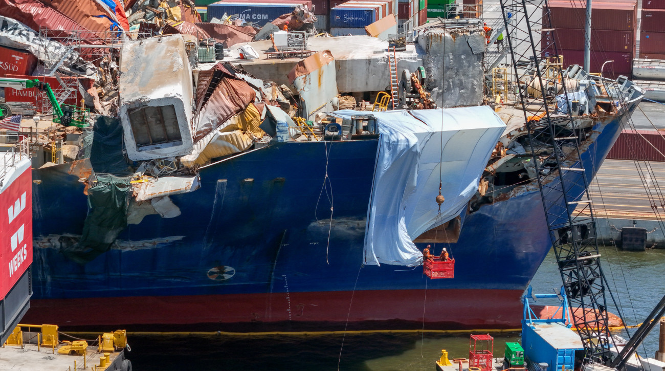 Salvage experts continue to clear the large amount of wreckage on the bow of the container ship Dali twelve weeks after the collapse of the Francis Scott Key Bridge. (Jerry Jackson/Baltimore Sun/Tribune News Service via Getty Images)