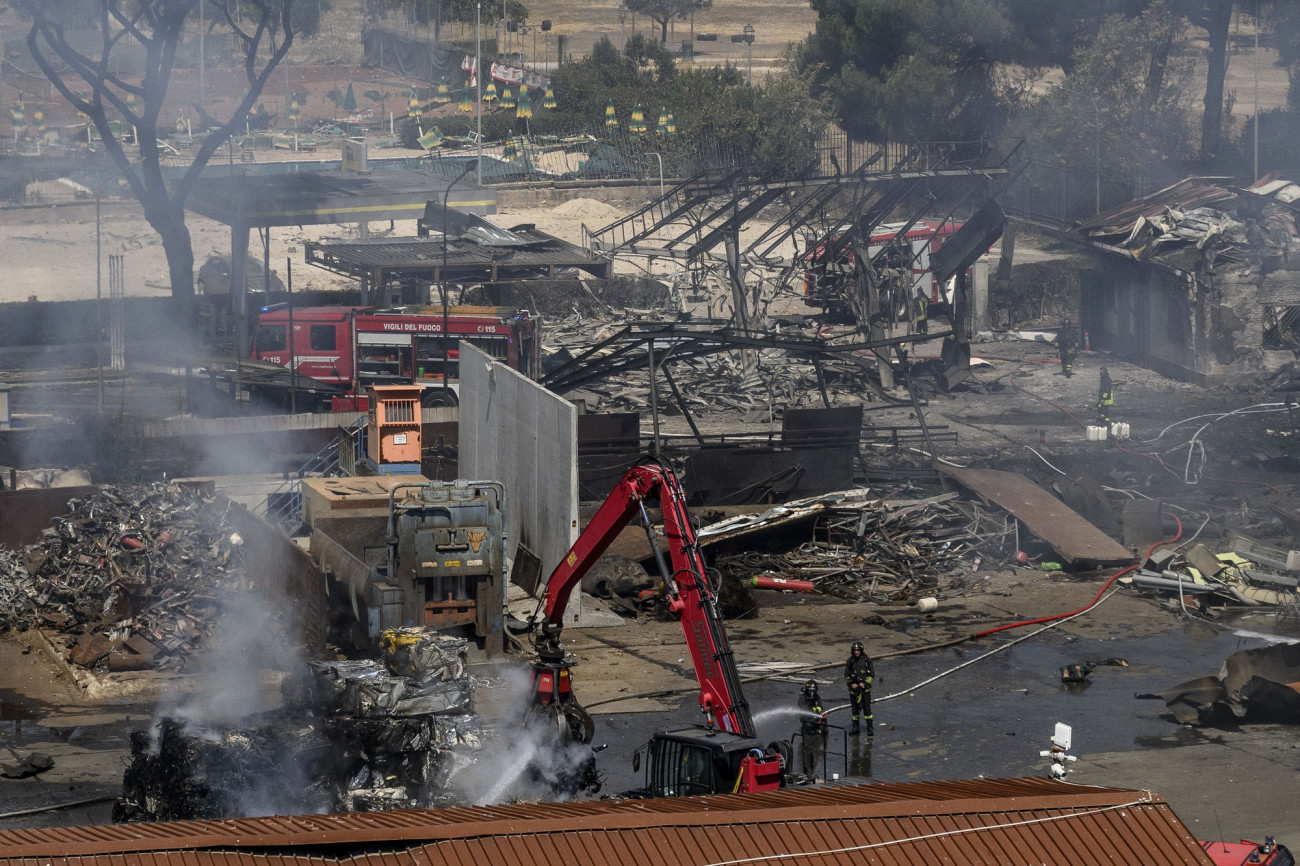 ROME, ITALY - JULY 4: Firefighters work at the site of the explosion at a petrol station in Via dei Gordiani, on July 4, 2025 in Rome, Italy. More than a dozen people have been injured, residents have been forced to flee and a summer camp was evacuated after a petrol station exploded in the Prenestino neighbourhood of Rome this morning. (Photo by Antonio Masiello/Getty Images)