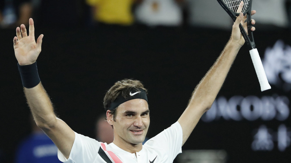 Melbourne, 2018. január 28.A svájci Roger Federer ünnepel, miután legyőzte a horvát Marin Cilicet az ausztrál nyílt teniszbajnokság férfi egyesének döntőjében Melbourne-ben 2018. január 28-án. Federer 6:2, 6:7 (5-7), 6:3, 3:6, 6:1 arányú győzelmével megvédte címét és megszerezte a 20. Grand Slam-trófeáját. (MTI/EPA/Mast Irham)