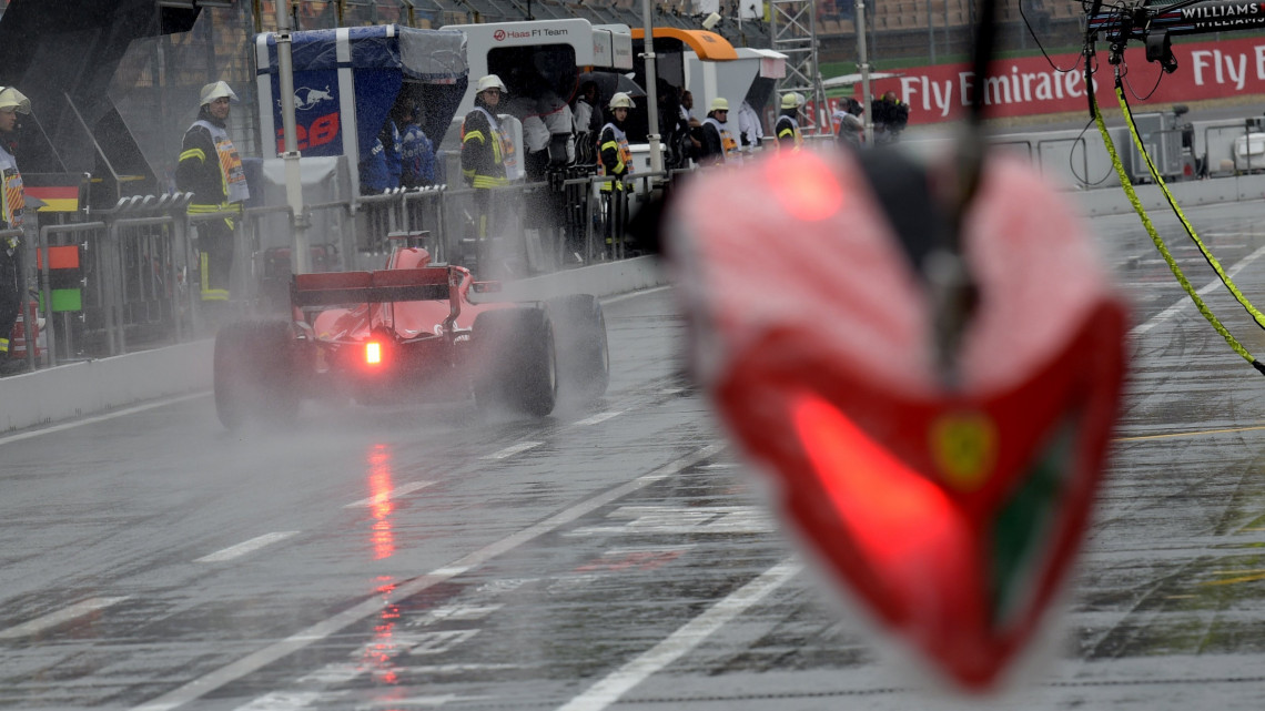 Hockenheim, 2018. július 21.Sebastian Vettel, a Ferrari német versenyzője a Forma-1-es autós gyorsasági világbajnokság Német Nagydíjának harmadik szabadedzésén a hockenheimi versenypályán 2018. július 21-én, egy nappal a futam előtt. (MTI/AP/Jens Meyer)