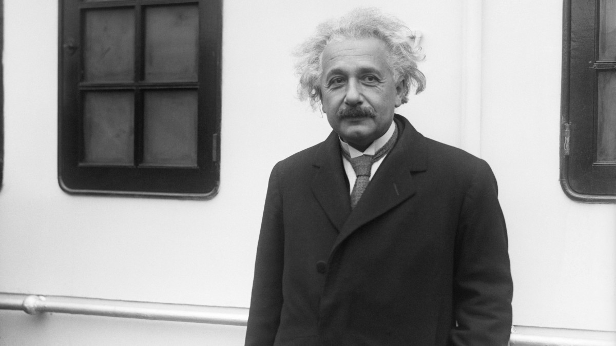(Original Caption) Changing his original plans of not leaving the Belgenland, until the liner arrived in California, where he will spend the winter months, continuing his renewed renovations of modern science, Professor Albert Einstein, left the vessel when it docked in New York, for a four day stay. he is shown above on arrival.