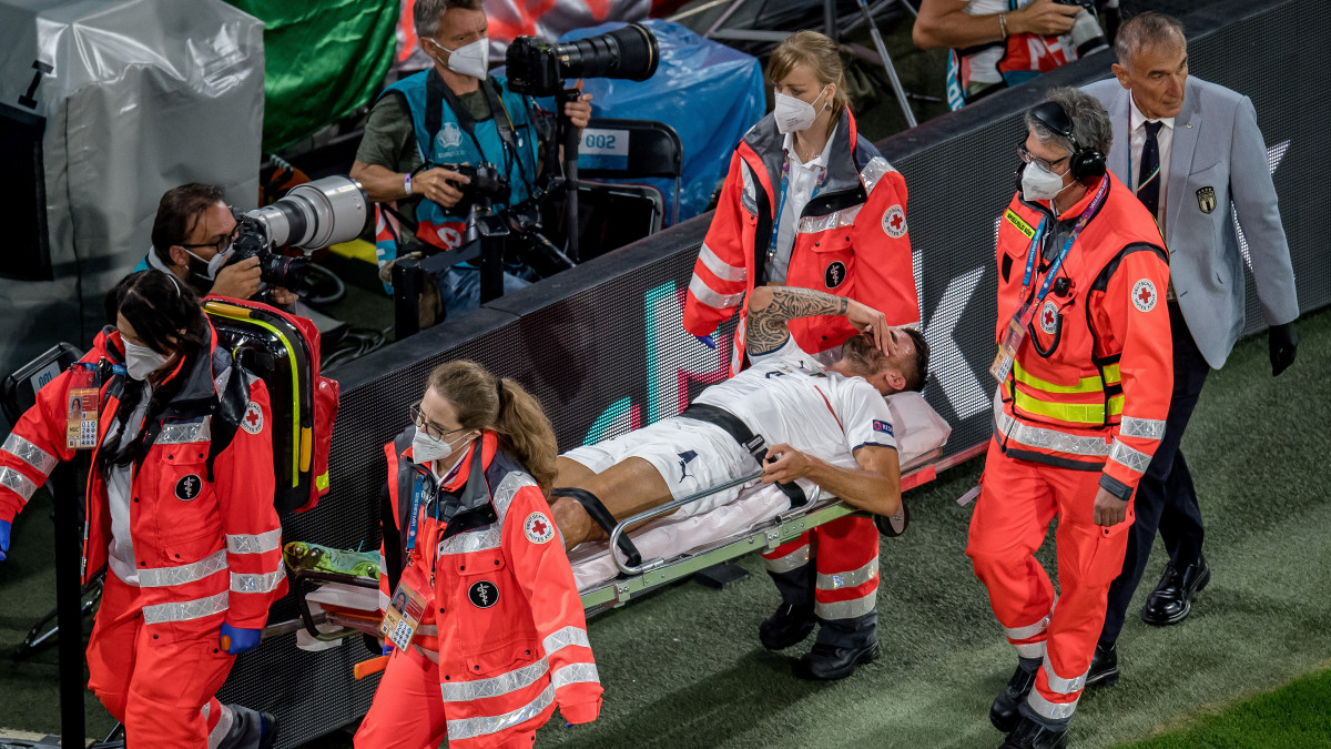 MUNICH, GERMANY - JULY 02: Leonardo Spinazzola of Italy leaves the stadium injured during the UEFA Euro 2020 Championship Quarter-final match between Belgium and Italy at Football Arena Munich on July 02, 2021 in Munich, Germany. (Photo by Markus Gilliar/Getty Images)