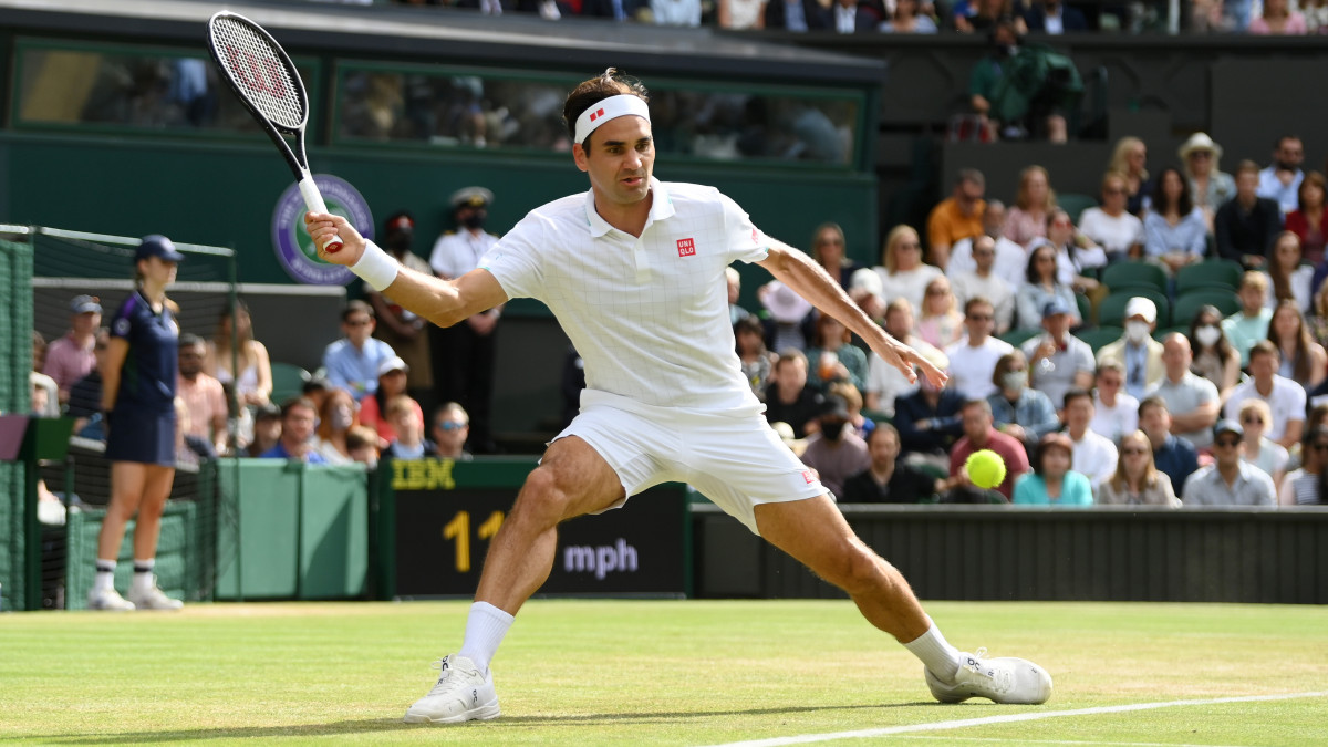LONDON, ENGLAND - JULY 03: Roger Federer of Switzerland plays a forehand during his mens singles third round match against Cameron Norrie of Great Britain during Day Six of The Championships - Wimbledon 2021 at All England Lawn Tennis and Croquet Club on July 03, 2021 in London, England. (Photo by Mike Hewitt/Getty Images)