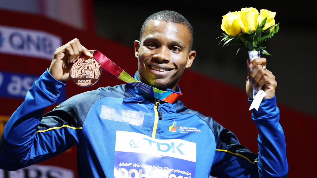 DOHA, QATAR - OCTOBER 02: Bronze medalist Alex QuiĂąĂłnez of Ecuador stands on the podium during the medal ceremony for the Mens 200 metres final during day six of 17th IAAF World Athletics Championships Doha 2019 at Khalifa International Stadium on October 02, 2019 in Doha, Qatar. (Photo by Michael Steele/Getty Images)