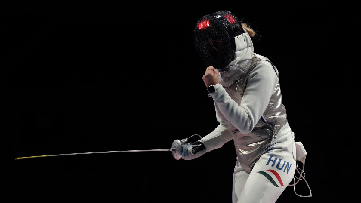 CHIBA, JAPAN - JULY 29: Flora Pasztor of Team Hungary celebrates during her bout against Alice Volpi of Team Italy Womens Foil Team Quarterfinal on day six of the Tokyo 2020 Olympic Games at Makuhari Messe Hall on July 29, 2021 in Chiba, Japan. (Photo by Jamie Squire/Getty Images)