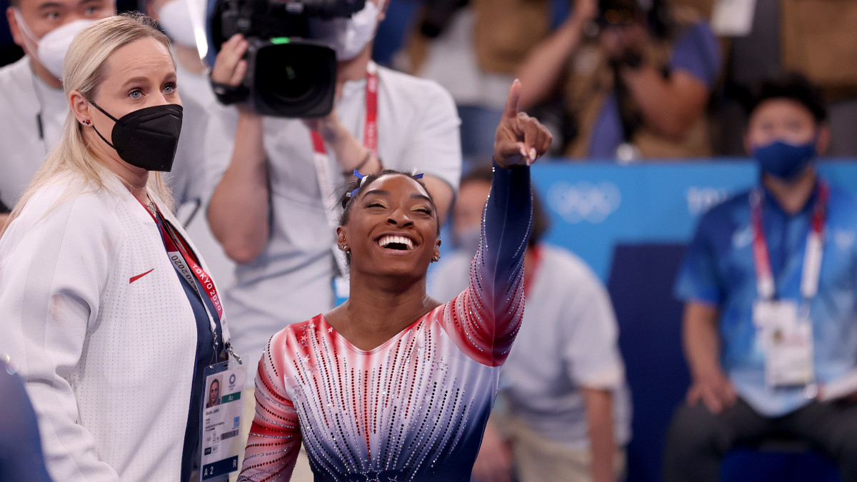 TOKYO, JAPAN - AUGUST 03: Simone Biles of Team United States reacts during the Womens Balance Beam Final on day eleven of the Tokyo 2020 Olympic Games at Ariake Gymnastics Centre on August 03, 2021 in Tokyo, Japan. (Photo by Laurence Griffiths/Getty Images)