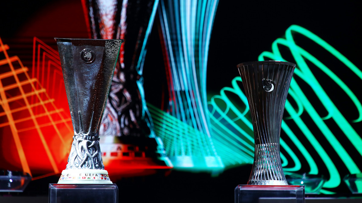 ISTANBUL, TURKEY - AUGUST 27: A detailed view of the UEFA Europa League trophy and the UEFA Europa Conference League trophy are seen during the UEFA Europa League 2021/22 Group Stage Draw on August 27, 2021 in Istanbul, Turkey. (Photo by Baris Acarli - UEFA/UEFA via Getty Images)