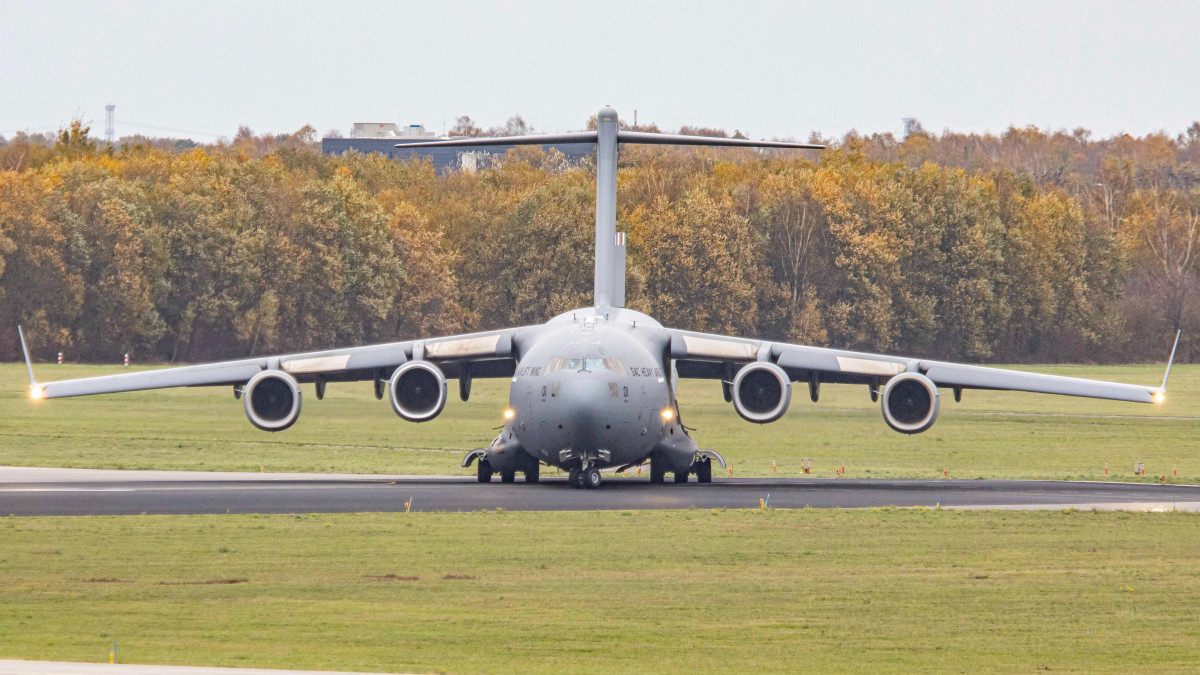 A SAC Strategic Airlift Capability Boeing C17 Globemaster III as seen taxiing and departing from Eindhoven International Airport and Air Base EIN EHEH in the Netherlands. The home base of SAC is HDF PĂĄpa Air Base. Members states are NATO members Bulgaria, Estonia, Hungary, Lithuania, the Netherlands, Norway, Poland, Romania, Slovenia and the United States of America, Partnership for Peace countries Finland and Sweden for the countries operation or UN, NATO or EU. The American made C-17 is a large military transport aircraft developed for the United States Air Force USAF by McDonnell Douglas for tactical and strategic airlift missions, transporting troops and cargo throughout the world or additional roles include medical evacuation and airdrop duties. C17 and SAC participated in the evacuation of Kabul airport in Afghanistan after the Taliban occupation of the country on August 2021. Eindhoven, the Netherlands on November 15, 2020 (Photo by Nicolas Economou/NurPhoto via Getty Images)