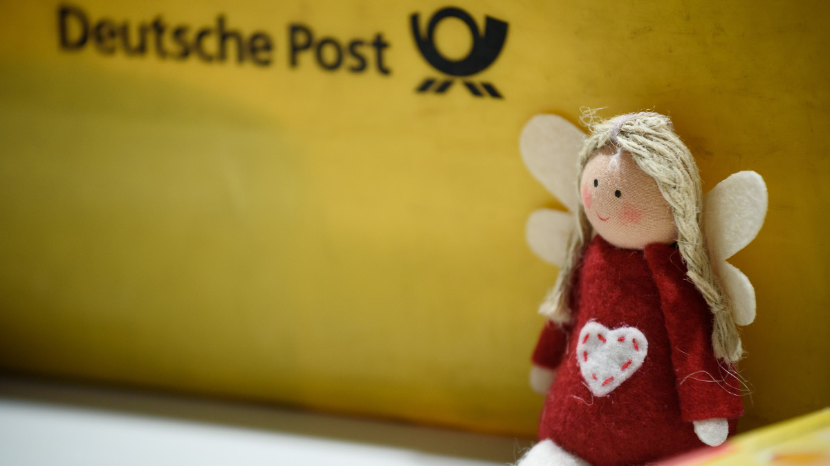 A stuffed toy depicting the Christ Child pictured next to a box of the German postal services Deutsche Post at the Christmas postal office inÂ Himmelstadt (lit. Heaven city), Germany, 27 November 2015. The Christmas postal offices opens for the 30th time at the first Advent. Photo: NICOLASÂ ARMER/dpa | usage worldwide   (Photo by Nicolas Armer/picture alliance via Getty Images)