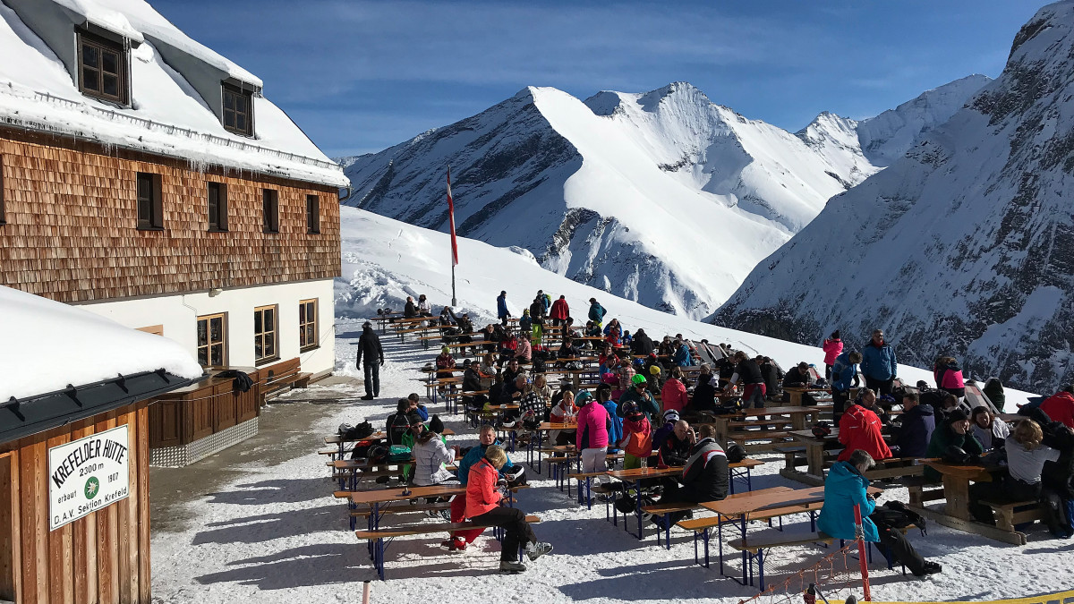 KAPRUN, AUSTRIA - FEBRUARY 05:  Visitors relax at Krefelder Huette mountain refuge under Kitzsteinhorn mountain at the Kaprun ski resort in the Austrian Alps on February 5, 2018 near Kaprun, Austria. Kaprun and nearby Zell am See are popular summer and winter tourist destinations.  (Photo by Sean Gallup/Getty Images)