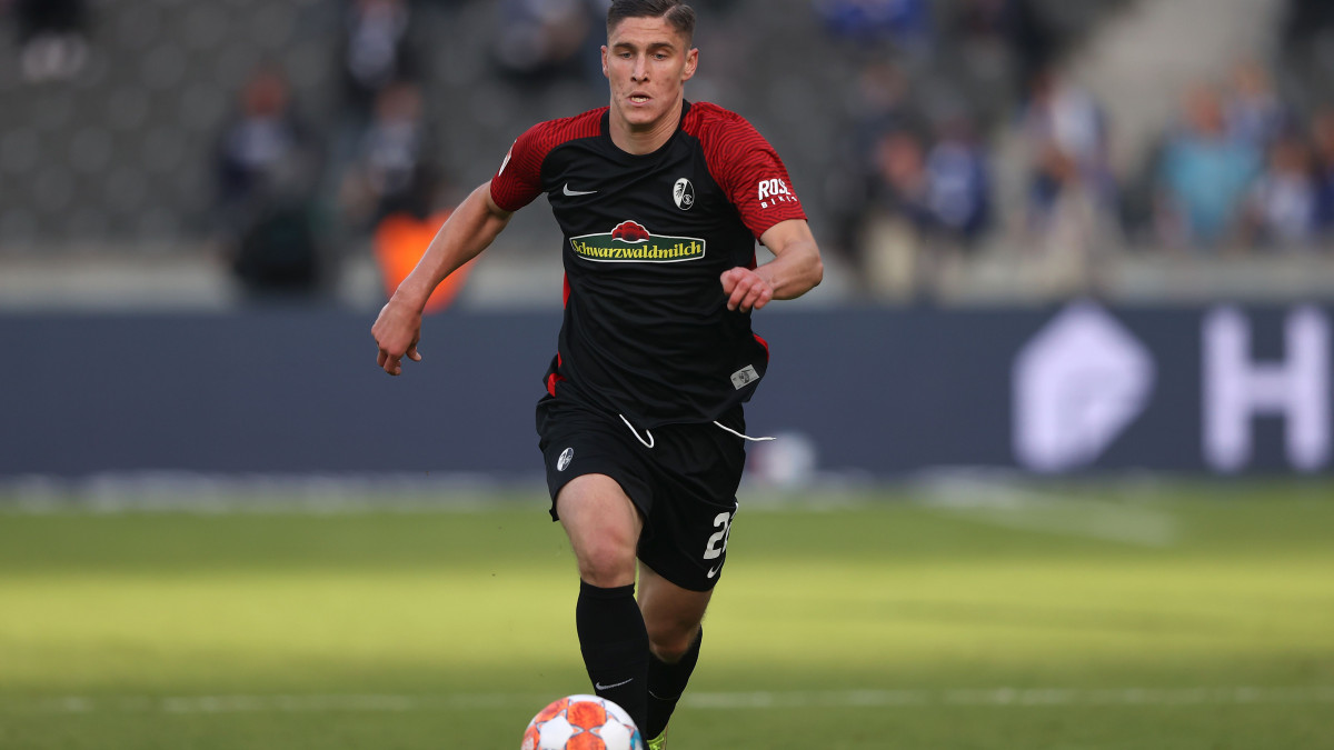 BERLIN, GERMANY - OCTOBER 02: Roland Sallai of Freiburg runs with the ball during the Bundesliga match between Hertha BSC and Sport-Club Freiburg at Olympiastadion on October 02, 2021 in Berlin, Germany. (Photo by Alexander Hassenstein/Getty Images)