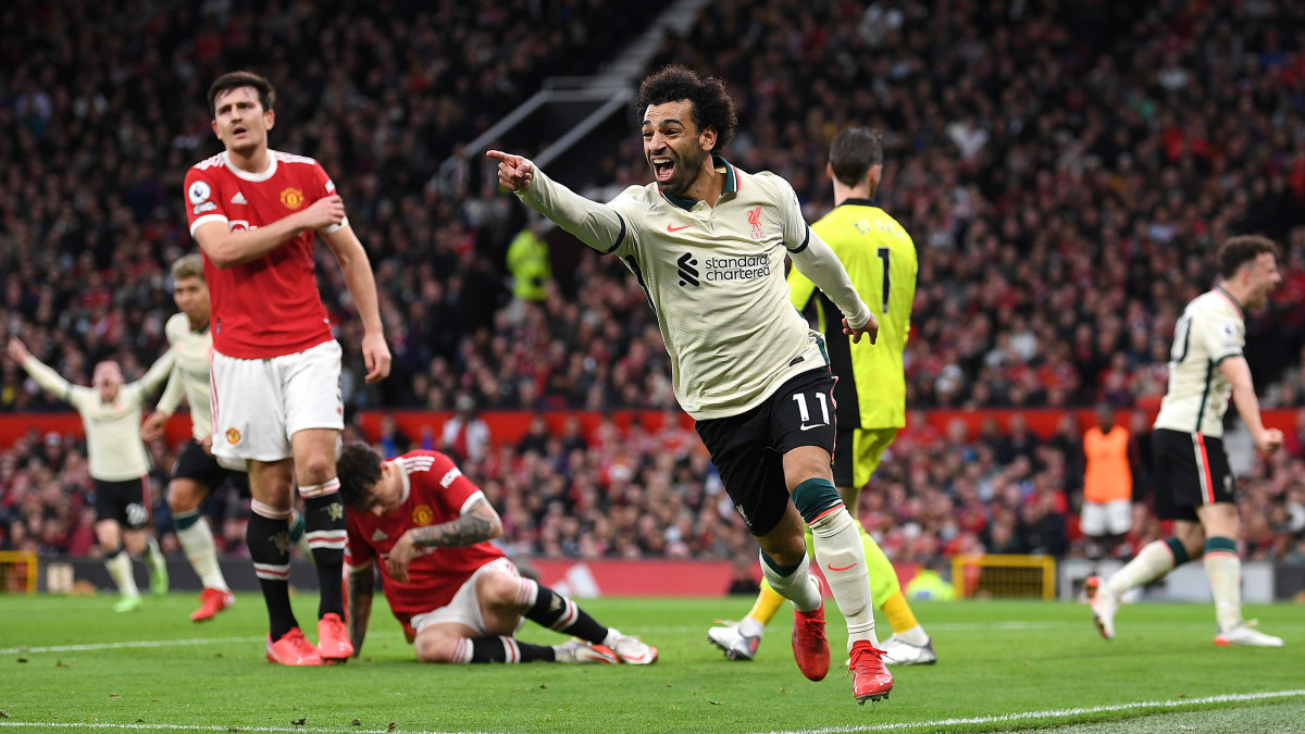 MANCHESTER, ENGLAND - OCTOBER 24: Mohamed Salah of Liverpool celebrates after scoring their sides third goal during the Premier League match between Manchester United and Liverpool at Old Trafford on October 24, 2021 in Manchester, England. (Photo by Michael Regan/Getty Images)
