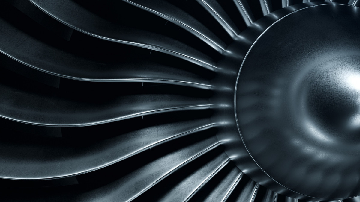 3D Rendering jet engine, close-up view jet engine blades. Blue tint