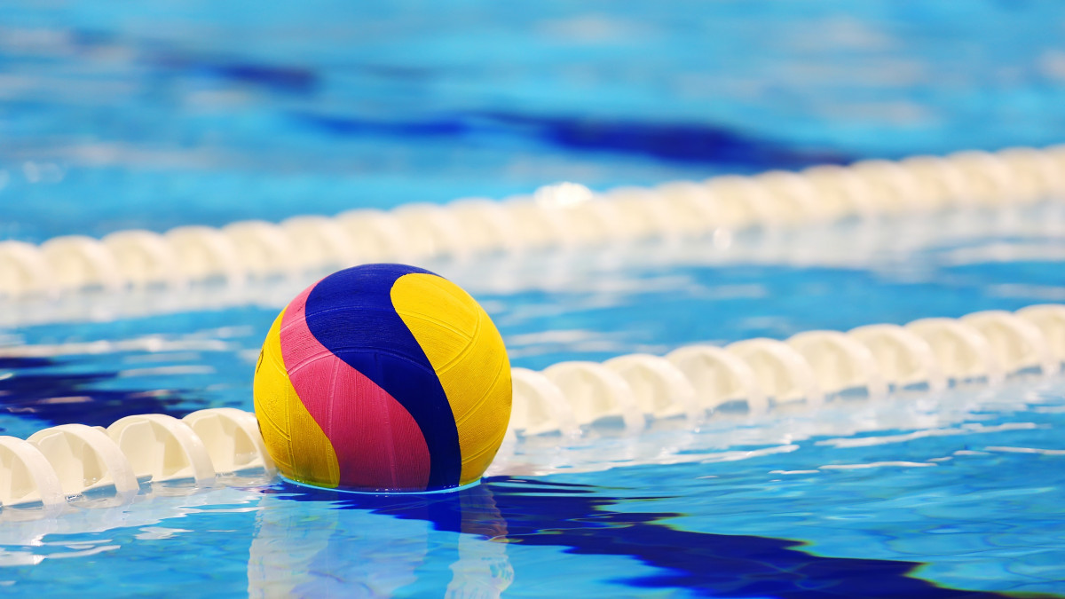 Colorful water ball in swimming-pool