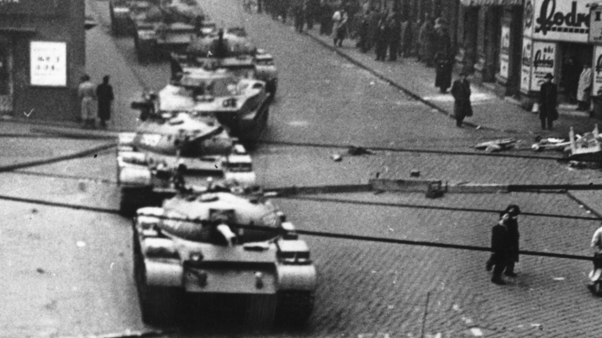 A squadron of Russian T55 main battle tanks rumbling down a street in Budapest during Russias invasion of Hungary.   (Photo by Keystone/Getty Images)