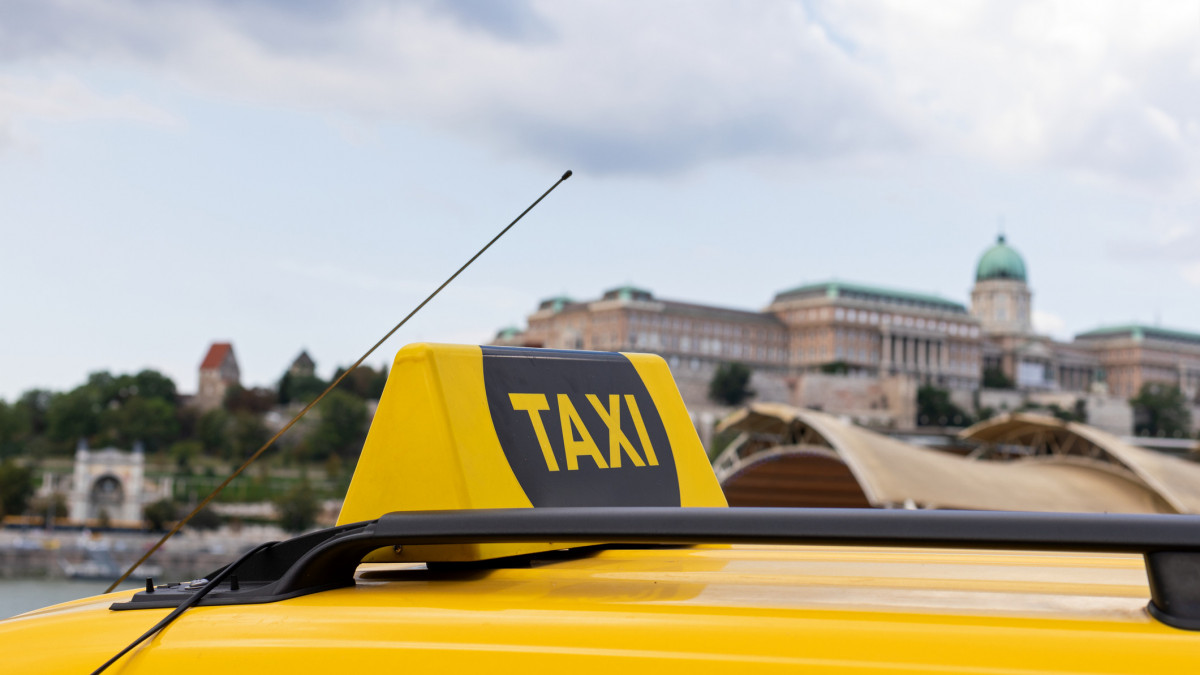 Yellow taxi cabs waiting for a passenger in Budapest