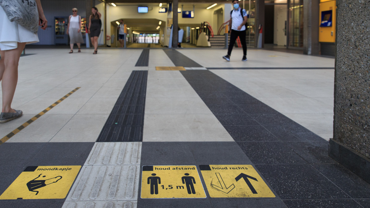 ZUTPHEN, NETHERLANDS - JUNE 18: Signs indicating coronavirus measures are seen at the train station June 18, 2021 in Zutphen, Netherlands. The Dutch government announced on Friday that it will end all restrictive measures as of June 26, except for the 1,5 metre distance. (Photo by Geronimo Matulessy/BSR Agency/Getty Images)r