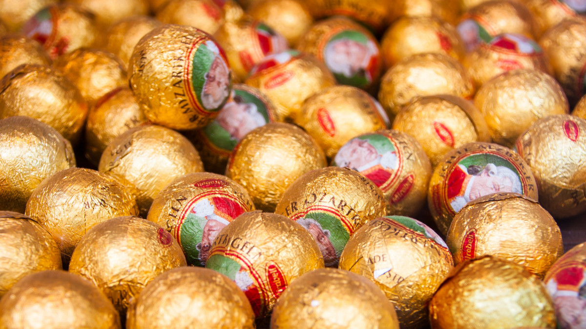 Austria, Salzburg, June 22,2012: Selective focus on a display with Mozartkugeln (Mozart Balls) It was created by the Salzburg confectioner, Paul FĂźrst, in 1890 and named after Wolfgang Amadeus Mozart. The Mirabell firm, based in GrĂśdig near Salzburg, chose the name, âReal Salzburg Mozartkugeln