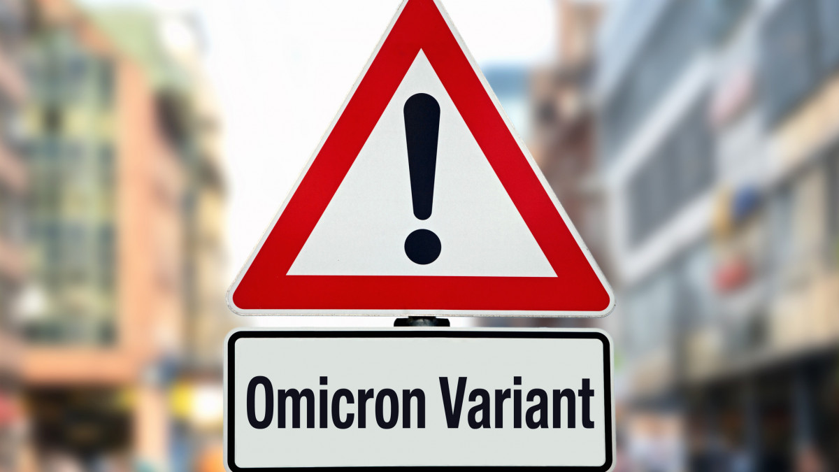 Omicron Variant at warning sign in city - new variant of Covid 19