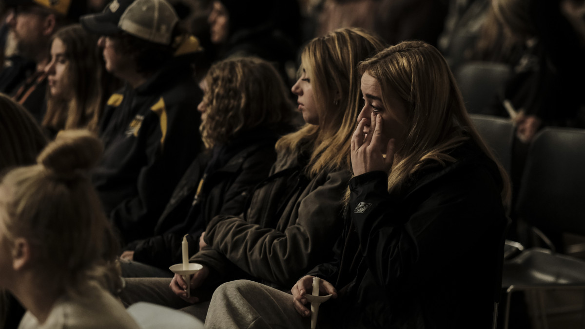 OXFORD, MI - NOVEMBER 30: Students, parents, teachers, and community members gather for a vigil at the Lake Point Community Church following a shooting at Oxford High School on November 30, 2021 in Oxford, Michigan. Three people were killed and six others wounded by the alleged shooter, a 15-year-old student who is now in police custody.  (Photo by Matthew Hatcher/Getty Images)
