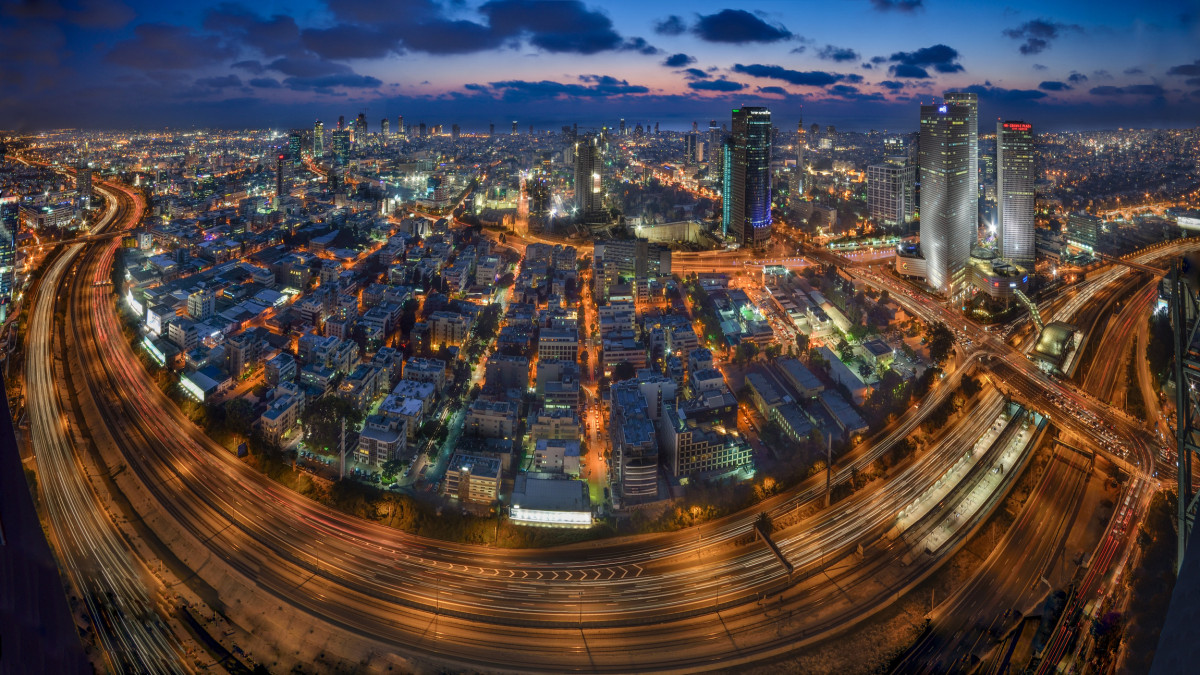 Dusk Panorama of Tel-Aviv sandwiched between the Ayalon freeway and the Mediterranean sea.