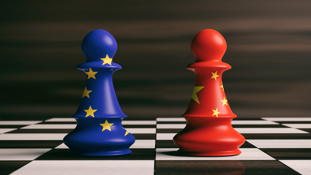 China and EU cooperation concept. China and European Union flags on chess pawns soldiers on a chessboard. 3d illustration