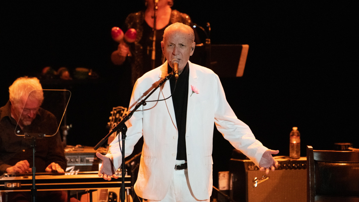 LOS ANGELES, CALIFORNIA - NOVEMBER 14: Musician Michael Nesmith of The Monkees performs onstage during the final show of The Monkees Farewell Tour at The Greek Theatre on November 14, 2021 in Los Angeles, California. (Photo by Scott Dudelson/Getty Images)