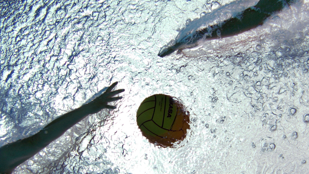 LONG BEACH, CA - JUNE 27:  An underwater view of the tip of sprint between Australia and Kazakhstan in the seventh place game during the 2004 FINA Womens Water Polo League Super Final on June 27, 2004 in Long Beach, California.