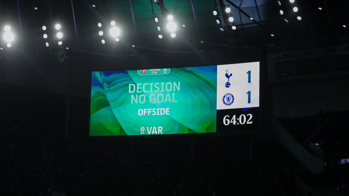 LONDON, ENGLAND - JANUARY 12: a VAR decision to rule out Harry Kane of Tottenham Hotspur goal to make it 1-1 is seen on the giant LED screen  during the Carabao Cup Semi Final Second Leg match between Tottenham Hotspur and Chelsea at Tottenham Hotspur Stadium on January 12, 2022 in London, England. (Photo by James Williamson - AMA/Getty Images)