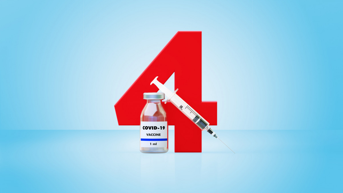 Syringe and COVID-19 vaccine bottle sitting next to a huge red number four on blue background, Horizontal composition with copy space. Great use for concepts related to efficacy of COVID-19 vaccines.