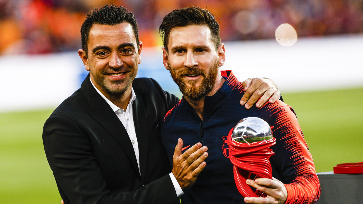 Xavi Hernandez and 10 Leo Messi from Argentina of FC Barcelona  during the La Liga football match between FC Barcelona v Real Sociedad at Camp Nou Stadium in Spain on May 20 of 2018. (Photo by Xavier Bonilla/NurPhoto via Getty Images)