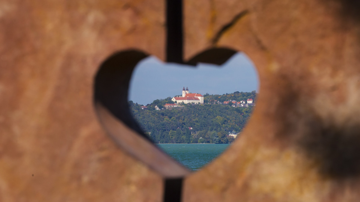 Tihany Abbey benedictine monastery view through heart shape at Lake Balaton, Hungary