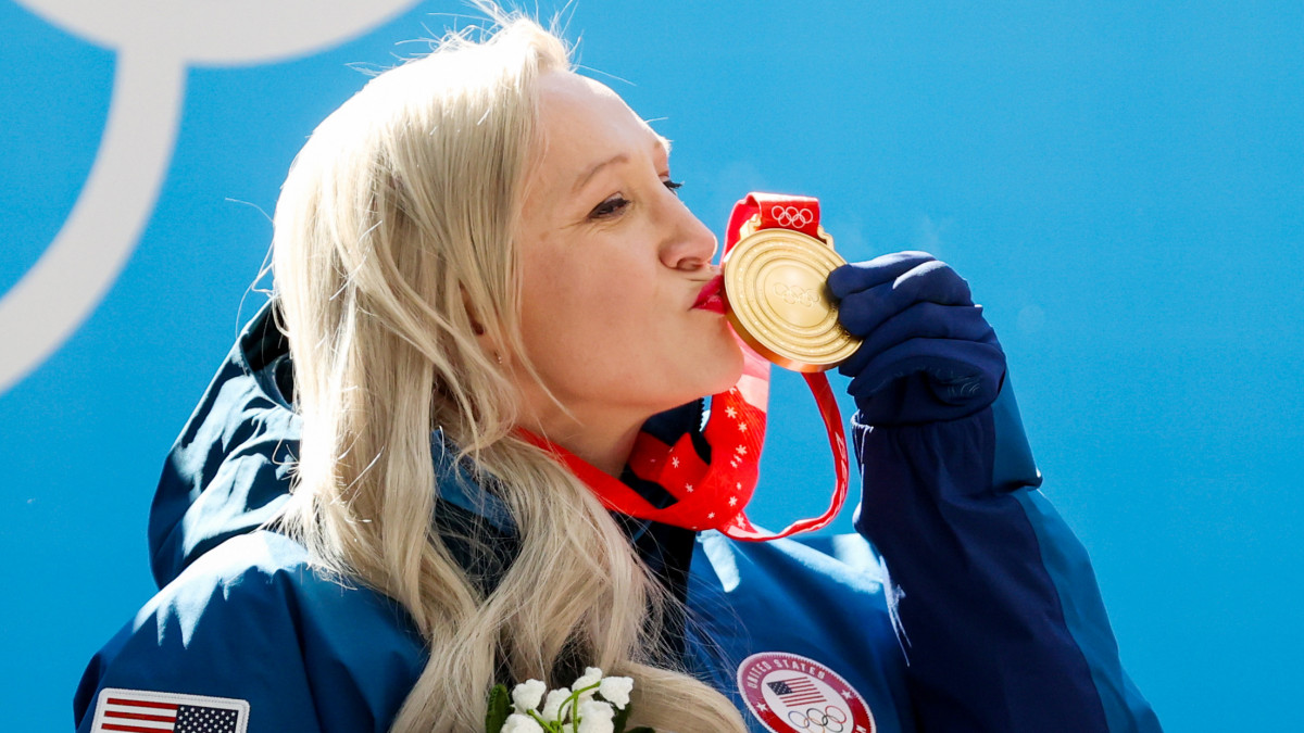 BEIJING, CHINA  FEBRUARY 14, 2022: Bobsledder Kaillie Humphries the United States kisses her gold medal at a victory ceremony for the womens monobob event during the Beijing 2022 Winter Olympic Games at the Yanqing National Sliding Centre. Anton Novoderezhkin/TASS (Photo by Anton Novoderezhkin\TASS via Getty Images)