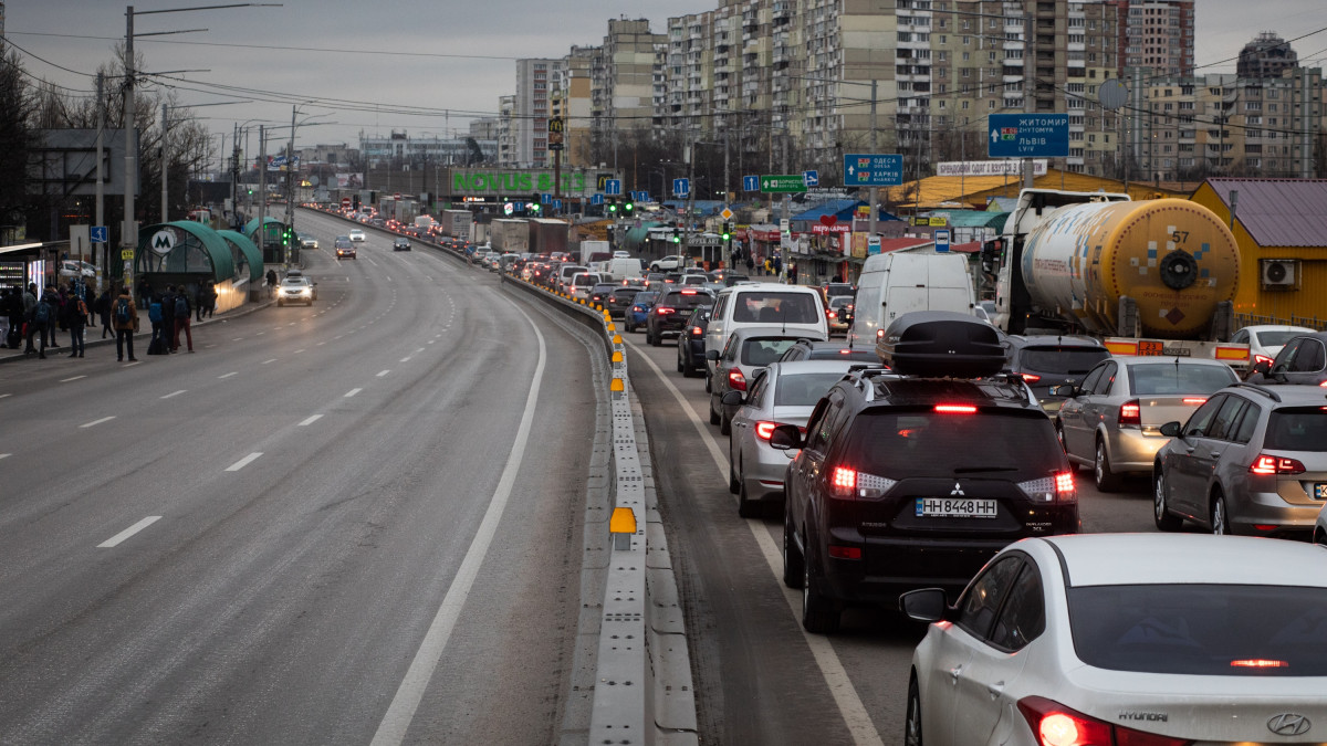 Truck drivers and residents seeking to leave the capital in a traffic jam in Kyiv, Ukraine, on Thursday, Feb. 24, 2022. Russian forces attacked targets across Ukraine after PresidentÂ Vladimir PutinÂ ordered an operation to demilitarize the country, prompting international condemnation and a U.S. threat of further severe sanctions on Moscow, sending markets tumbling worldwide. Photographer: Erin Trieb/Bloomberg via Getty Images