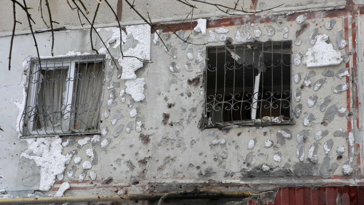 KHARKIV, UKRAINE - FEBRUARY 26, 2022 - Damage done to a residential building is seen after shelling in Kharkiv, northeastern Ukraine. (Photo credit should read Vyacheslav Madiyevskyy/ Ukrinform/Future Publishing via Getty Images)