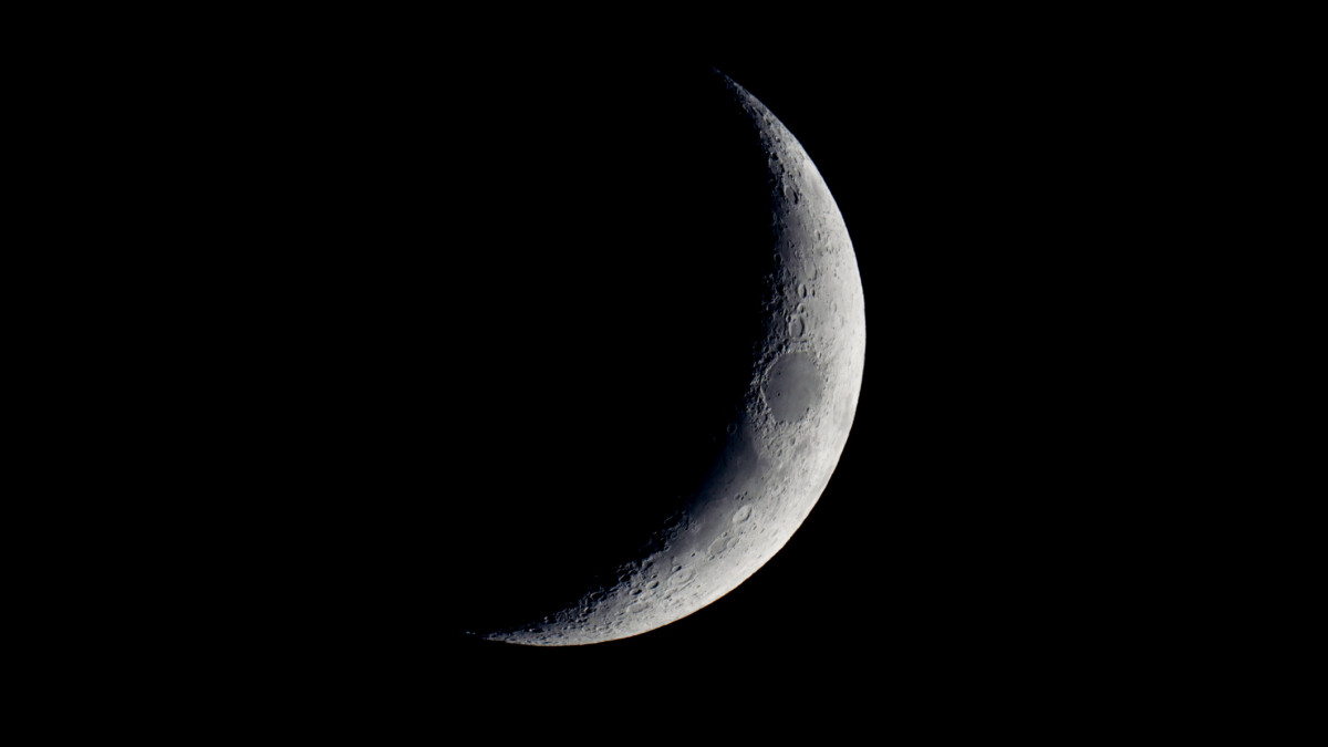 France. Seine et Marne. Close up on the crescent Moon (age : 4,2 days). View like in binoculars or small telescope. Image taken on december 18th 2020 at dusk.