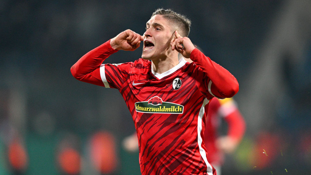 02 March 2022, North Rhine-Westphalia, Bochum: Soccer: DFB-Pokal, VfL Bochum - SC Freiburg, Quarterfinal, Vonovia Ruhrstadion: Freiburgs Roland Sallai celebrates after his goal to make it 1:2. Photo: David Inderlied/dpa - IMPORTANT NOTE: In accordance with the requirements of the DFL Deutsche FuĂball Liga and the DFB Deutscher FuĂball-Bund, it is prohibited to use or have used photographs taken in the stadium and/or of the match in the form of sequence pictures and/or video-like photo series. (Photo by David Inderlied/picture alliance via Getty Images)