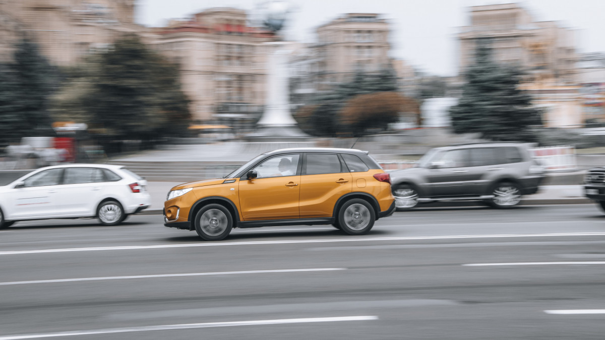 Ukraine, Kyiv - 2 June 2021: Yellow Suzuki Vitara car moving on the street. Editorial