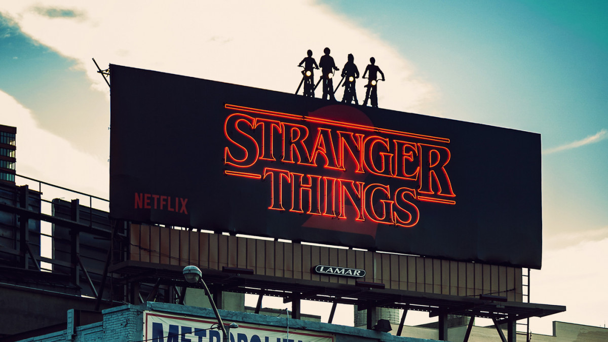 New York, United States - December 20, 2017 -  Netflixâs Stranger Things 2 and other billboards on 623 - 11th ave and Broadway 2017 NYC at sunset