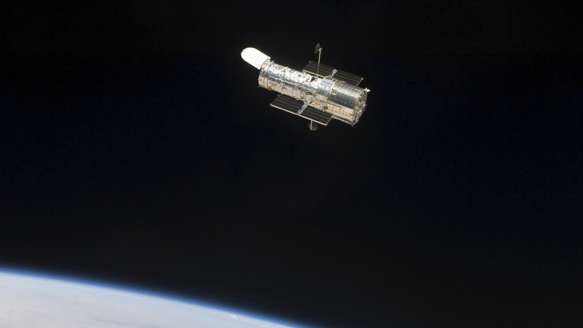 May 19, 2009 - A still image of the Hubble Space Telescope as the two spacecraft begin their relative separation after having been linked together for the better part of a week.