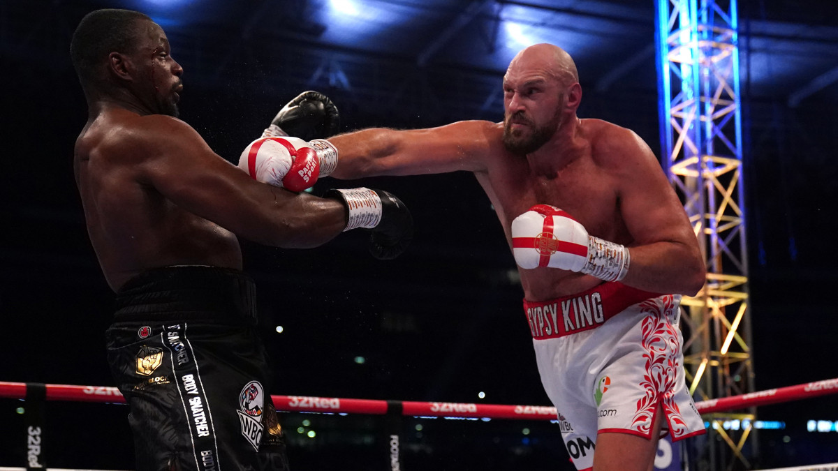 Tyson Fury (right) and Dillian Whyte during the WBC heavyweight title fight at Wembley Stadium, London. Picture date: Saturday April 23, 2022. (Photo by Nick Potts/PA Images via Getty Images)